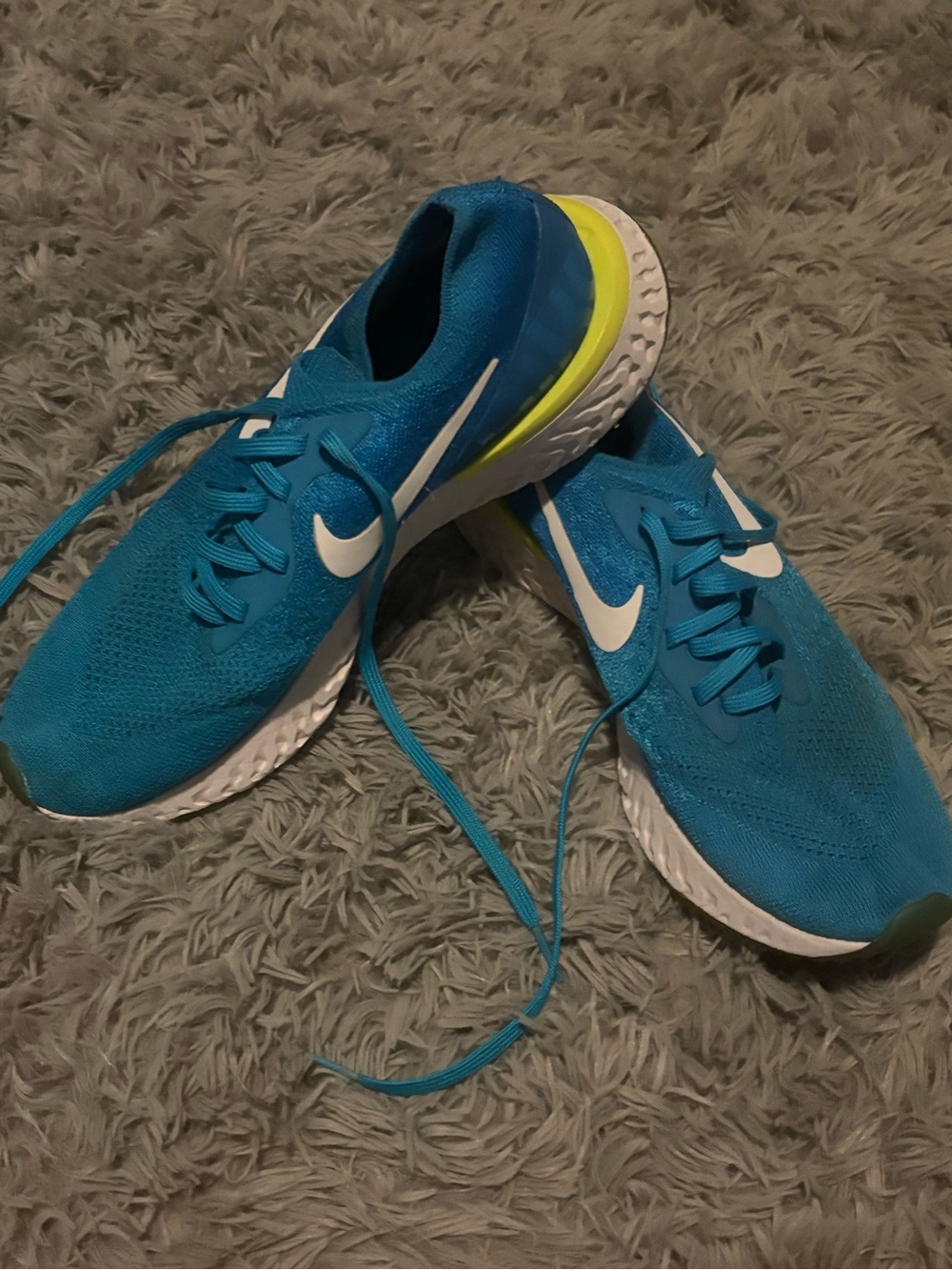 Nike Men's Teal Blue Running Shoes with White Swoosh and Yellow Heel Accent
